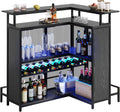 Black L Shaped Mini Home Bar Unit with Music Sensing LED Light, Tall Bars Furniture Table with Wine Rack Alcohol Storage Glasses Hanger Footrest A311